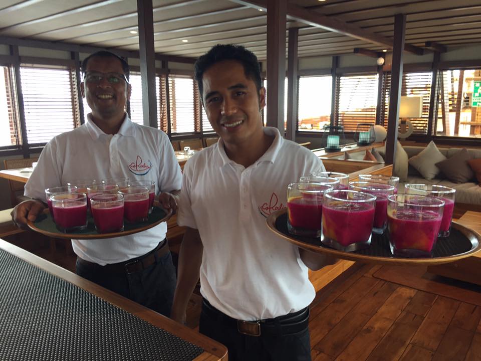 Coralia-Liveaboard-Team-Serving-Drinks